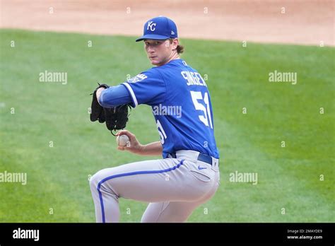 Kansas City Royals Starting Pitcher Brady Singer Winds Up During The