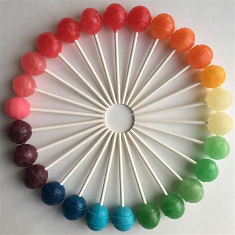 Brightly Hued Candies and Other Objects Arranged by Color to Create ...