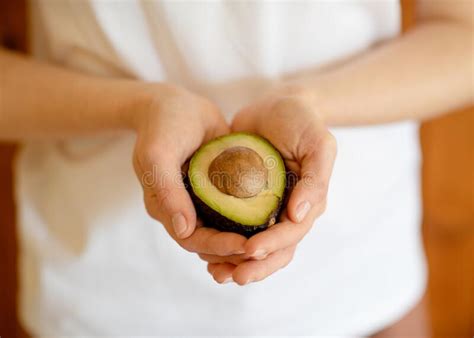 Person Holding An Avocado Stock Photo Image Of Health 221866086