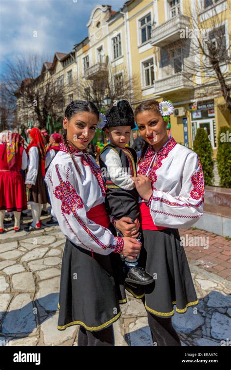 Few Bulgarian Folklore Dancers Posing During The Traditional Folklore