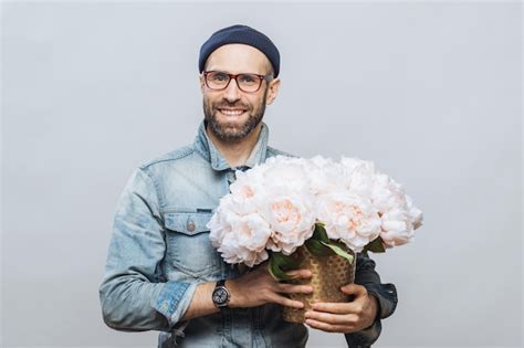 Premium Photo Satisfied Bearded Male With Cheerful Expression Has