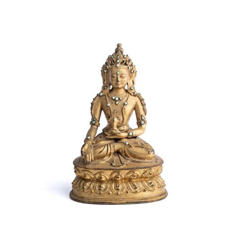 At Auction A SINO TIBETAN GILT BRONZE FIGURE OF RATNASAMBHAVA 18TH