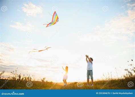 Children Running With Kite In The Field Stock Photo Image Of Little