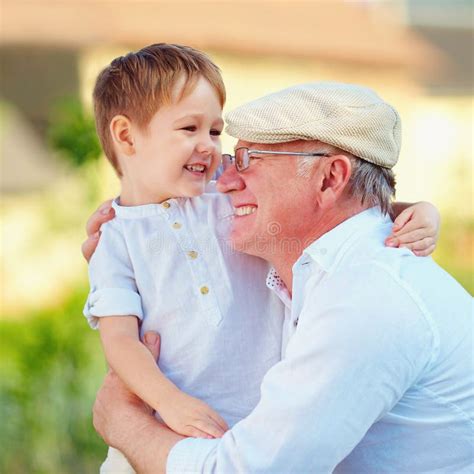 Portrait Happy Grandpa Grandson Embracing Outdoors Stock Photos Free