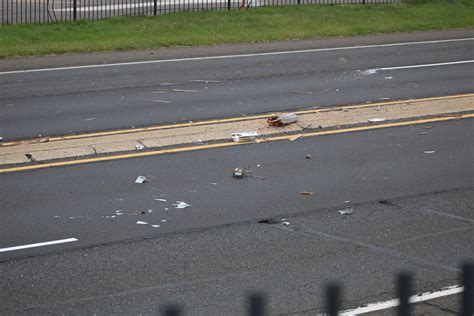 Dump Truck Strikes Overpass Causes Road Closure