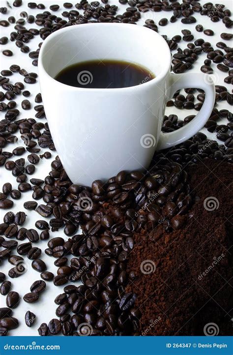 A Mug Of Coffee Surrounded By Coffee Beans Stock Image Image Of Drink