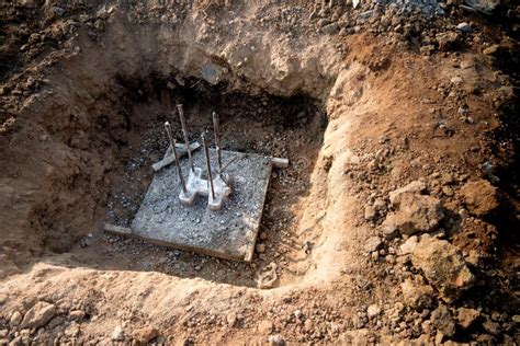 Holes With Foundation Pile Prepared Before Building A House Stock