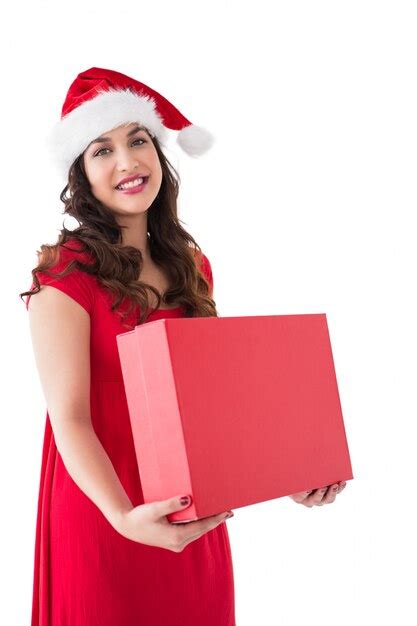 Premium Photo Festive Brunette Holding Red Box