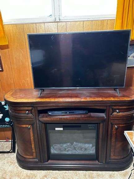 TV, Entertainment Center, Fireplace - Prime Time Auctions, Inc.