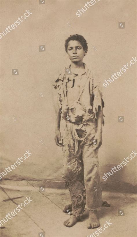 Young African American Refugee Wearing Rags Editorial Stock Photo