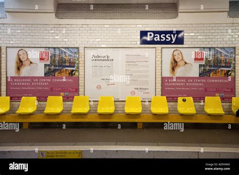 Row of yellow plastic seats at Passy metro station in Paris Stock Photo ...