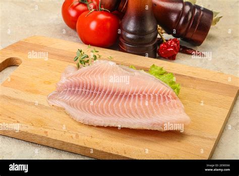 Raw Tilapia Fish Fillet For Cooking Stock Photo Alamy