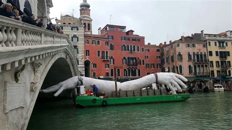 Contemporary Sculpture by Lorenzo Quinn Emerges from Venice's Lagoon