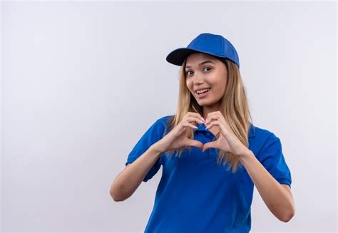 Repartidor Joven Sonriente Con Uniforme Azul Y Gorra Que Muestra El