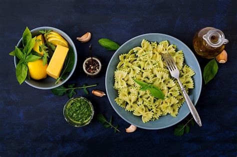 Premium Photo Vegan Farfalle Pasta In A Basil Spinach Sauce With Garlic Flat Lay Top View