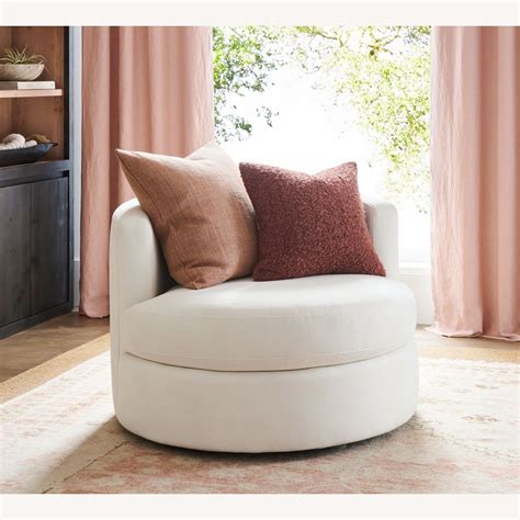 Pottery Barn Balboa Upholstered Swivel Armchair Aptdeco