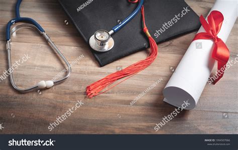 Diploma Graduation Hat Stethoscope On Wooden Stock Photo 1994507066