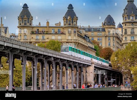 Having just departed Passy station, a Paris Metro Line 6 Metro train ...