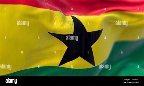 Close-up view of Ghana National flag waving. The Republic of Ghana is a ...