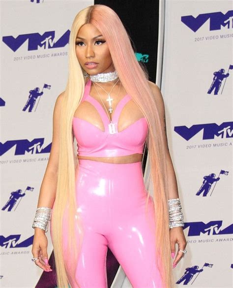 Nicki Minaj Showing Off Her Ample Cuves In A Pink Latex Bodysuit From