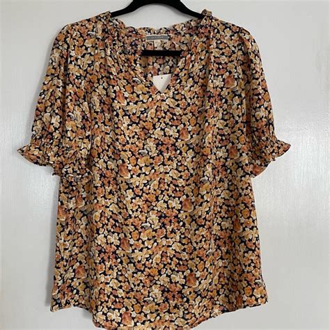 Pleione Tops Pretty Navy And Shades Of Orange Floral Top Poshmark