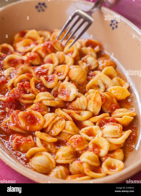 Tasty homemade orecchiette with tomato sauce Stock Photo - Alamy