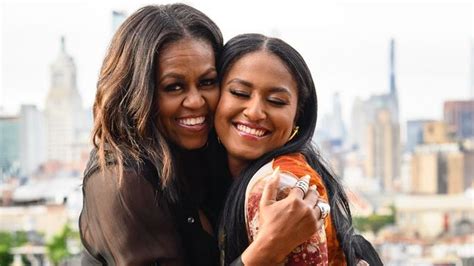 Michelle Obama's daughter Sasha, 23, rocks rainbow heels as she poses at rooftop bar with famous ...