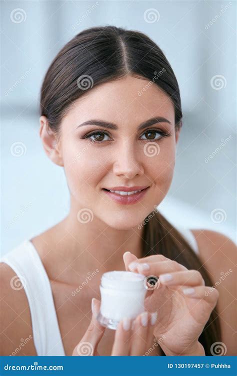 Face Skin Care Beautiful Woman With Facial Cream Cosmetics Stock