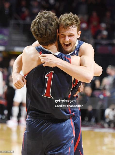 Jordan Hunter And Tanner Krebs Of The Saint Marys Gaels Hug On The