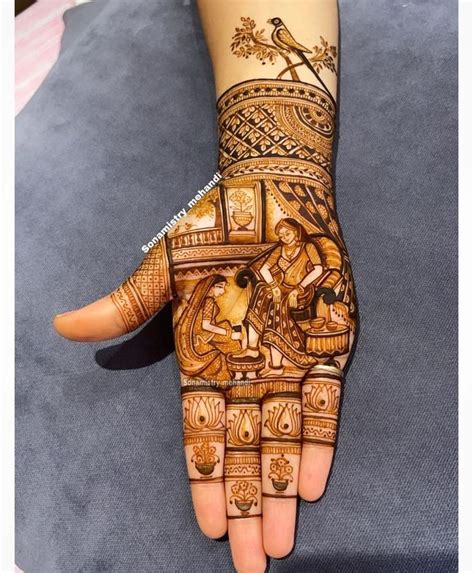 Someone Is Holding Their Hand Painted With Henna