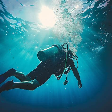 Premium Photo Back View Of A Man Diving Underwater With Scuba Gear