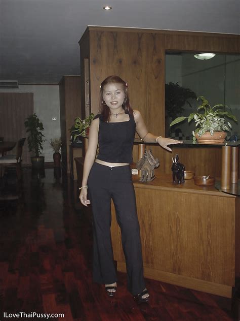 Foxy Asian Teen Babe On High Heels Taking Off Her Clothes And Posing Nude Porn Pictures XXX