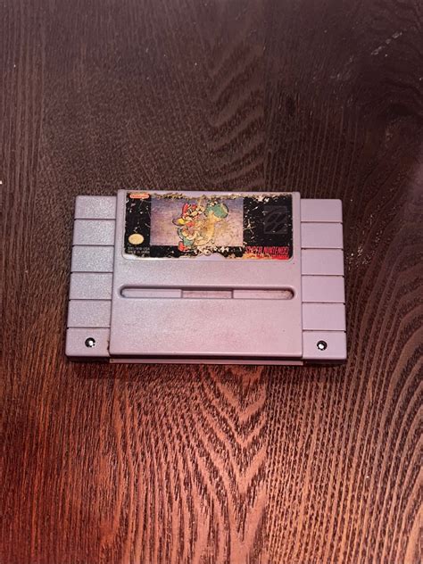 SUPER MARIO WORLD SNES 1994 Super Mario game cartridge, Hobbies & Toys ...