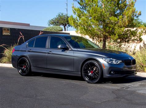 19 Inch Staggered Variant Xenon Satin Black W Red Cap On A 2018 Bmw