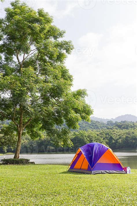 Dome tent camping at lake side 10968468 Stock Photo at Vecteezy