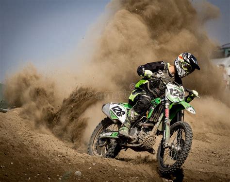 Rider Riding Green Motocross Dirt Bike Picture. Image: 83012062