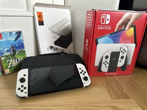 Nintendo Switch OLED Stan Idealny Polroczny Na Gwarancji 27 Gier