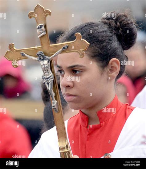 A Member Of The Hispanic Community At Holy Annunciation Church At Saint Gabriel Parish In