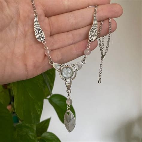 Keltische Ketting Met Vleugels En Rozenkwarts Kralen Sb Designs