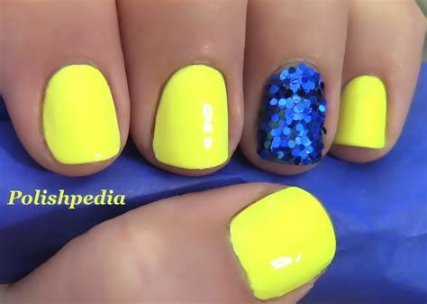 Neon Yellow Nails With a Blue Glitter Accent Nail | Polishpedia: Nail Art | Nail Guide | Shellac ...