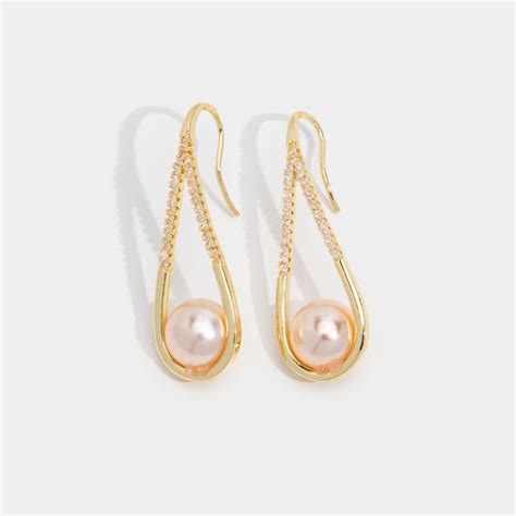 Venus Golden Pearl Drop Earrings Rosado Hill