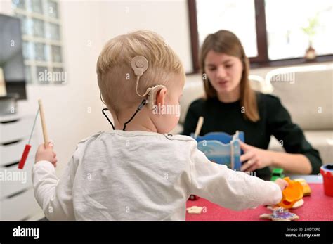 Mom Infant Hearing Aids Hi Res Stock Photography And Images Alamy