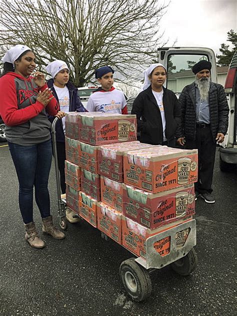 Sikh community fattens Auburn Food bank pantry with generous donation | Auburn Reporter