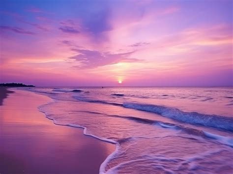 Premium Photo | Summer beach with blue water and purple sky at the sunset