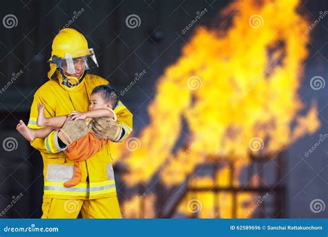 Fireman Rescued The Child From The Fire Stock Photo Image 62589696