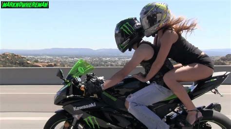 A Beautiful Girl Riding A Motorcycle On The Freeway A Girl In A Tank Top Riding A Sportbike