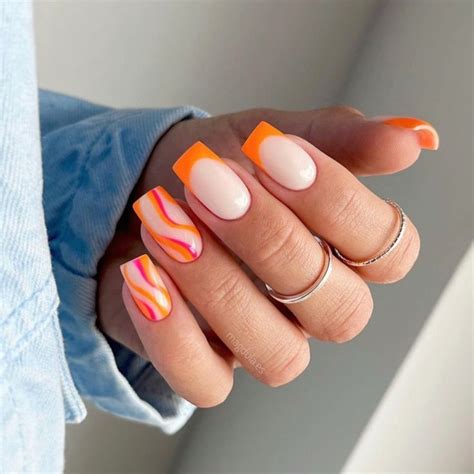 Check Out These Hot Orange French Tip Nails With Pink And Orange Swirls