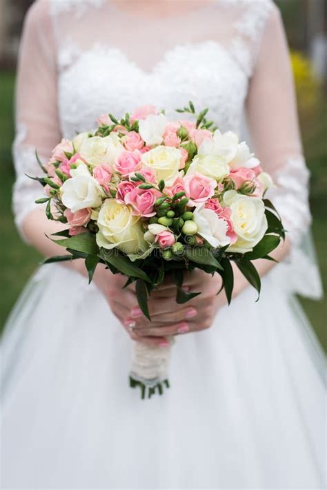 Bridal Bouquet with White and Pink Roses. the Bride in White Wedding ...