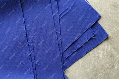 Premium Photo | Blue textile on grey background Fabric texture