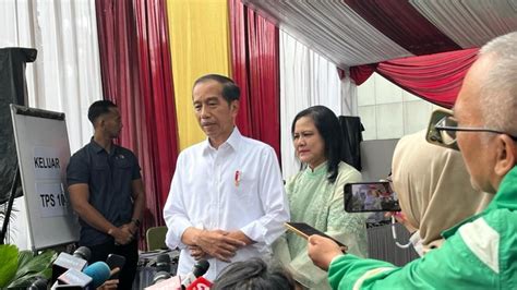 Didampingi Istri Tiba Di TPS 10 Gedung LAN Gambir Jokowi Harap Pemilu